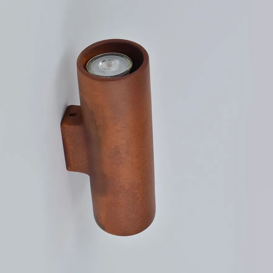 UMA C Zylindrische Wandleuchte in Rost